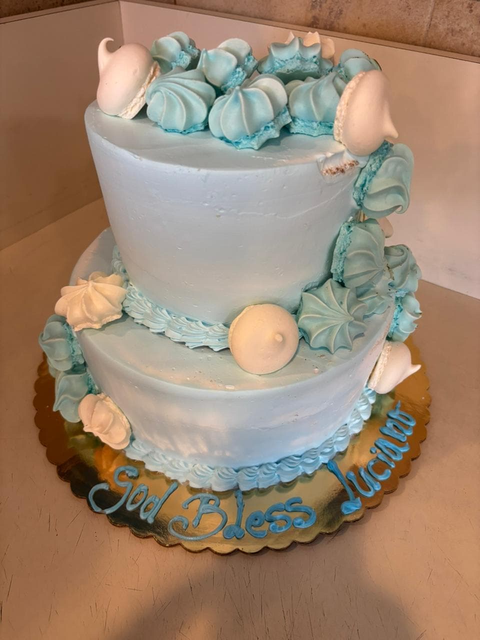 Pale blue two-tier baby shower cake
