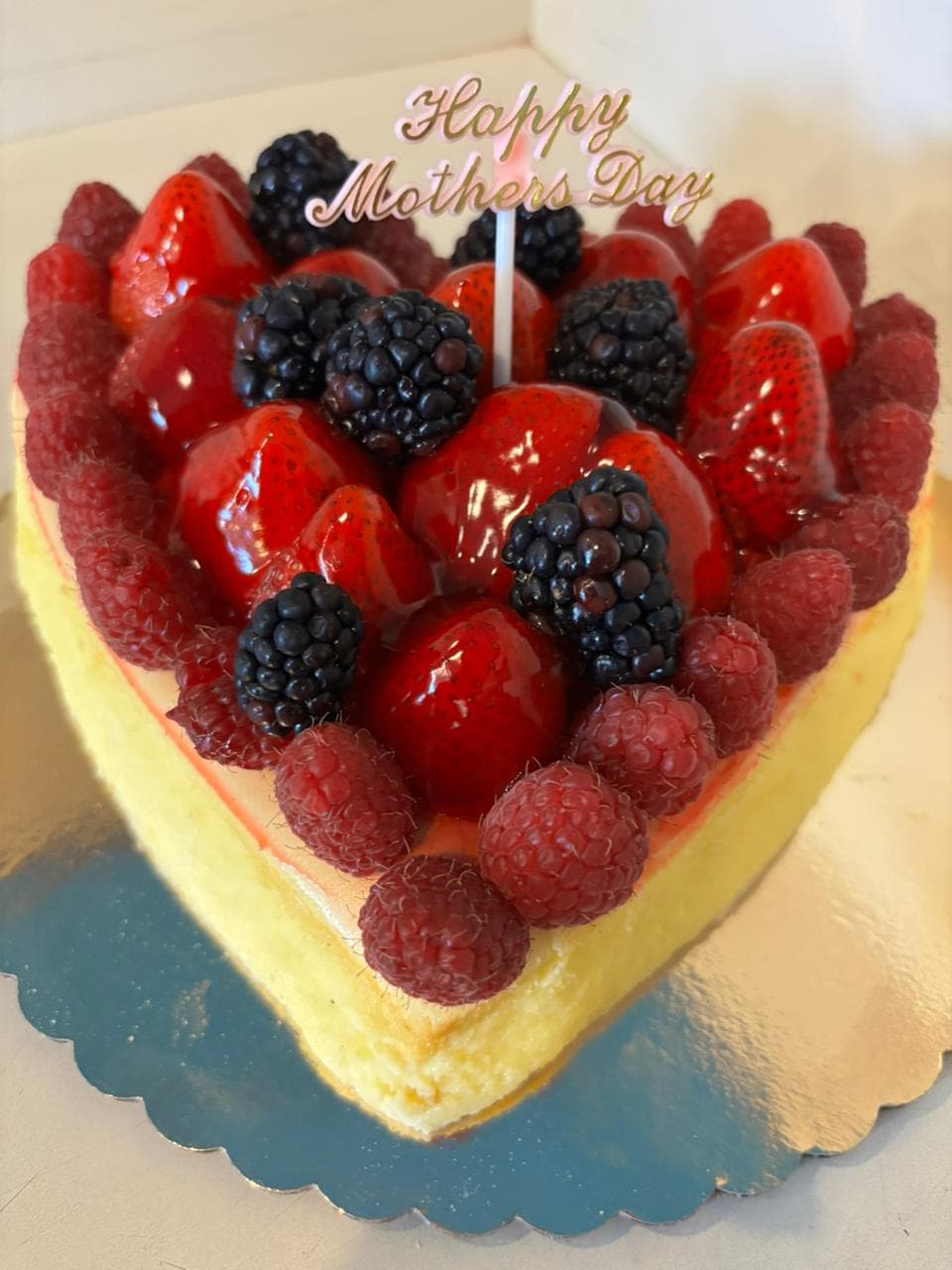 Heart-shaped fresh berry Mother's Day cake