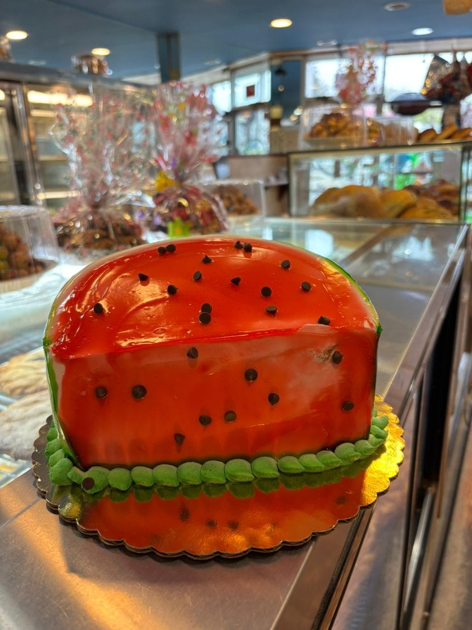 Watermelon-shaped novelty cake