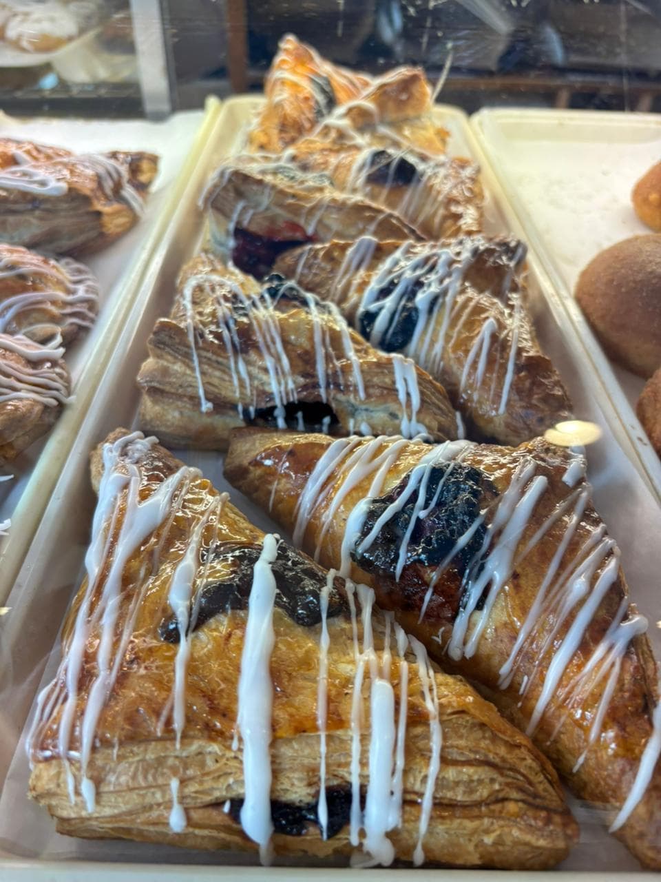 Glazed danishes and lobster-tail pastries