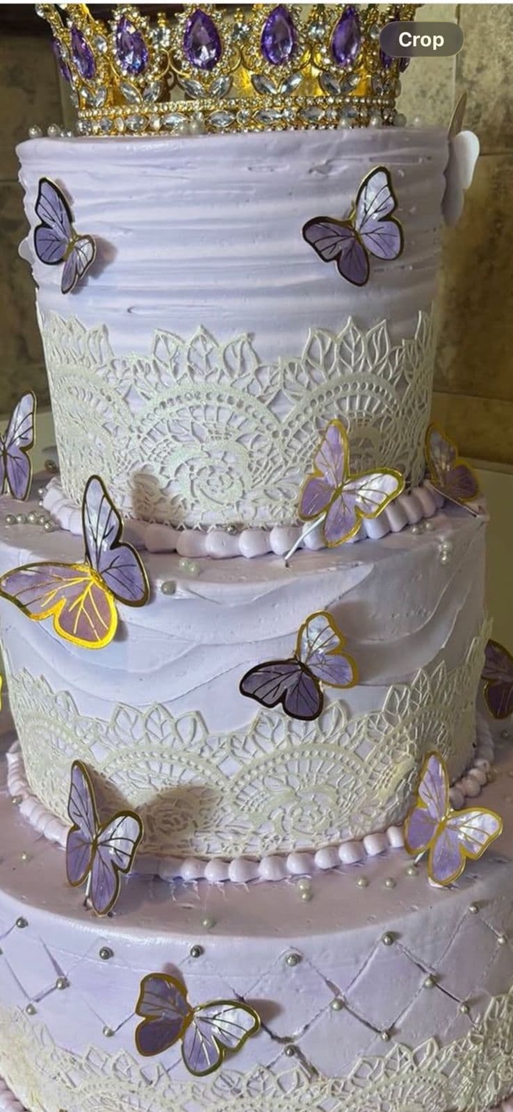 Elegant three-tier butterfly celebration cake