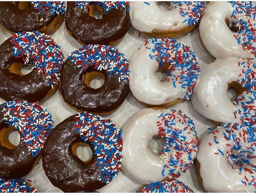 Glazed and chocolate donuts with patriotic sprinkles